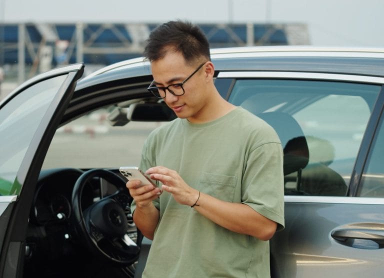 man looking at phone
